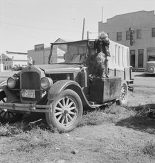 Family, one month from South Dakota, now on the road..., Tulelake, Siskiyou County, California, 1939 Creator: Dorothea Lange.