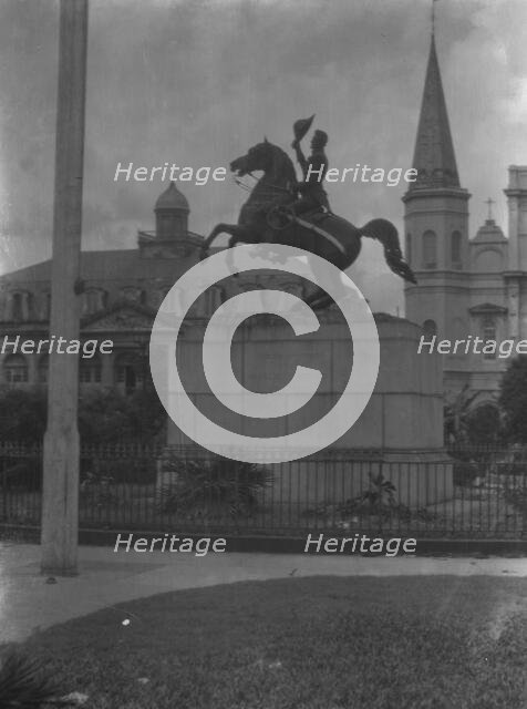 Jackson monument in Jackson Square with the Cabildo and St. Louis Cathedral, New Orleans, c1920-26. Creator: Arnold Genthe.
