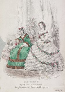 Two women and a child wearing the latest fashions, 1861. Artist: Anon