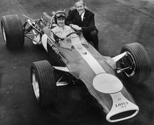 Graham Hill and Colin Chapman with Lotus 49, 1967. Artist: Unknown