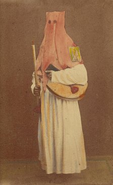 Unidentified man in long hood holding a candle and book, standing, about 1870. Creator: Giorgio Conrad.