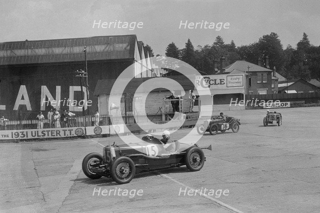 Aston Martin, Austin Ulster TT car and Austin 7, BARC meeting, Brooklands, Surrey, 1933. Artist: Bill Brunell.