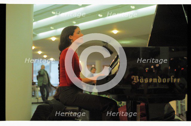 Zoe Rahman, RFH Foyer, 2004.   Artist: Brian O'Connor.