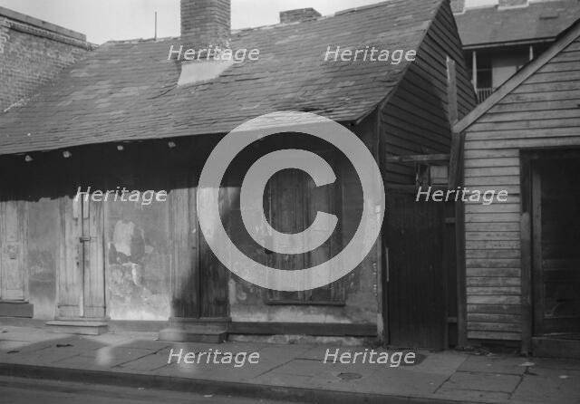 Houses in the French Quarter, New Orleans, between 1920 and 1926. Creator: Arnold Genthe.