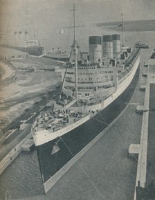 'Arrival of RMS Cunard White Star liner Queen Mary in King George V Graving Dock', 1936. Artist: Unknown.