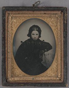 Portrait of a young girl dressed in dark clothes, wearing dark gloves, about 1860. Creator: Unknown.