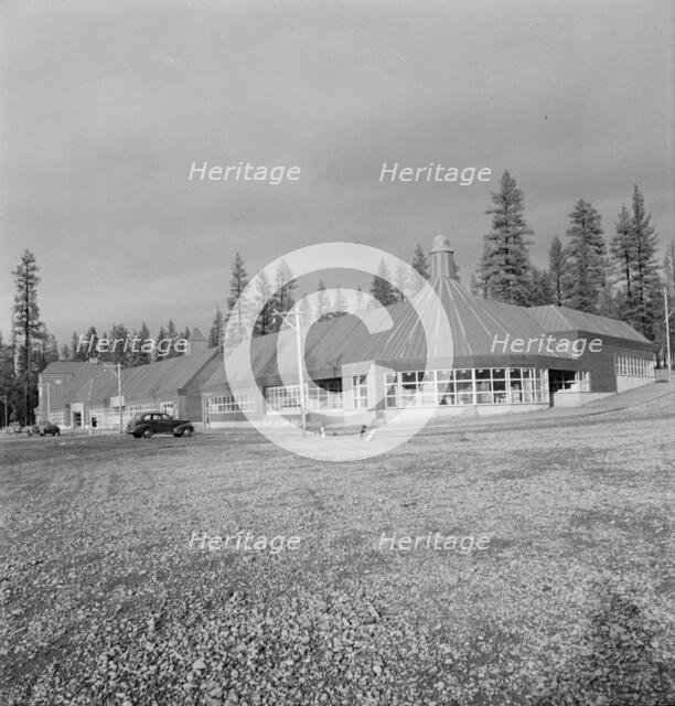 Stores and community center in model lumber company town, Gilchrist, Oregon, 1939. Creator: Dorothea Lange.