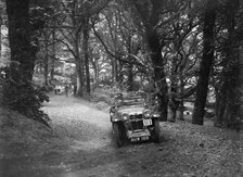 MG Magna competing in the B&HMC Brighton-Beer Trial, Fingle Bridge Hill, Devon, 1934. Artist: Bill Brunell.