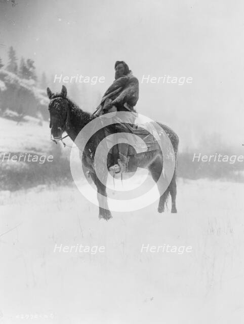 The scout in winter-Apsaroke, c1908. Creator: Edward Sheriff Curtis.