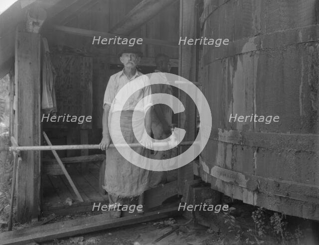 Turpentine "stiller" near Valdosta, Georgia, 1937. Creator: Dorothea Lange.