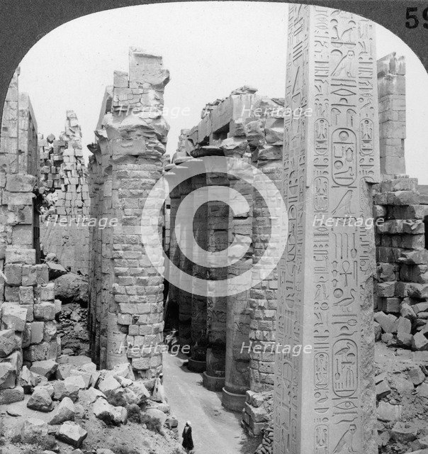 'Middle aisle of the great hall and obelisk of Thutmosis I, temple at Karnak, Thebes, Egypt', 1905.Artist: Underwood & Underwood
