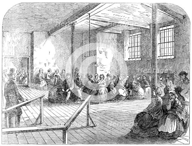 The Cotton Famine: waiting-room at the district provident institution, Manchester, 1862. Creator: Unknown.