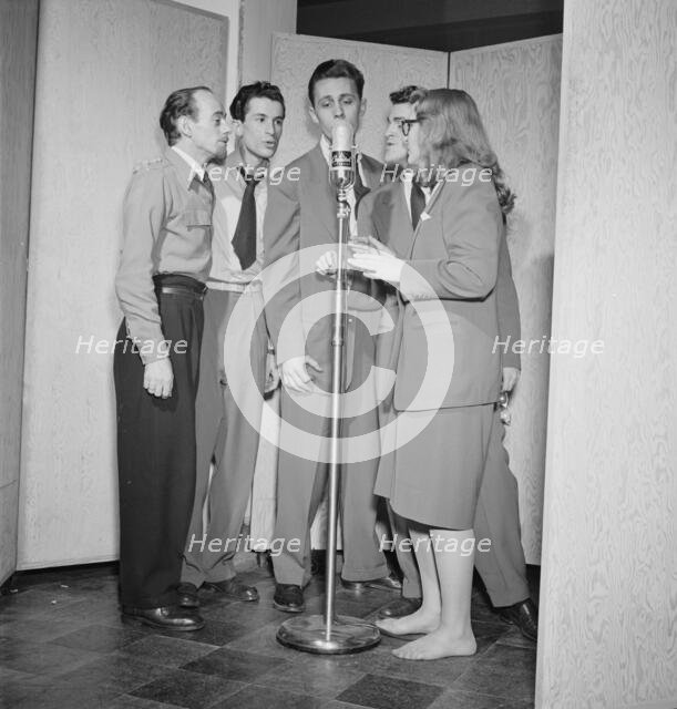 Portrait of Dave Lambert, Jerry Duane, Wayne Howard, Jerry Packer, and Margaret Dale, N.Y., 1947. Creator: William Paul Gottlieb.