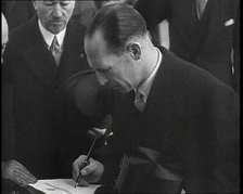 George II, King of the Hellenes Writing Something, 1930s. Creator: British Pathe Ltd.