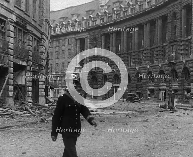 Air Raid Wardens in Bombed Out Streets, 1940. Creator: British Pathe Ltd.