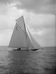 The 8 Metre 'Spero' (H8) sailing upwind, 1912. Creator: Kirk & Sons of Cowes.