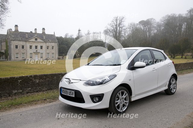 2010 Mazda 2 Sport Artist: Unknown.