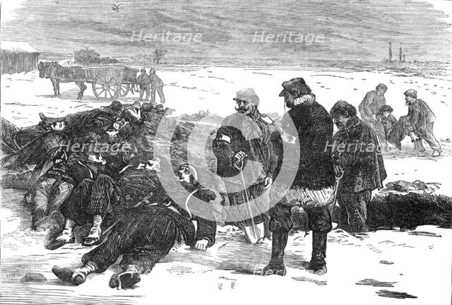 Burying French soldiers outside the village of Chevilly, 1871. Creator: Unknown.