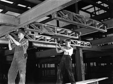 Engineers lifting steelwork into position, South Yorkshire, 1954. Artist: Michael Walters