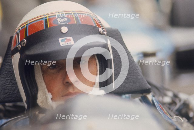 Jackie Stewart at the wheel of a racing car. Artist: Unknown