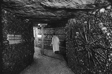 The Catacombs, Paris, 1931.Artist: Ernest Flammarion