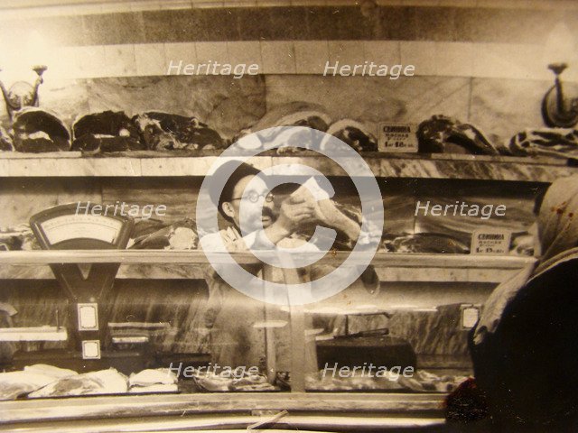 Meat counter in a Soviet food store, USSR, 1960s. Artist: Anon