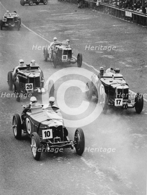 1933 Ulster TT, MG Magnette K3 Nuvolari, car number 17, trails Riley Artist: Unknown.