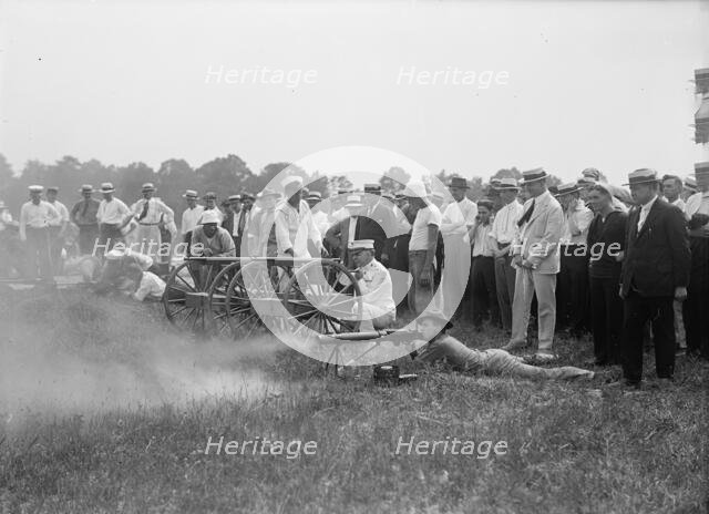 Marine Corps Rifle Range, Winthrop, Md. - Gen. Barnett Testing Colt's Automatic Machine Gun, 1917. Creator: Harris & Ewing.