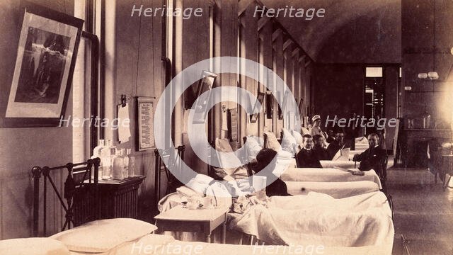 Bellevue Hospital, New York City: a ward for male patients with case-notes...,  c1885/1898. Creator: Unknown.