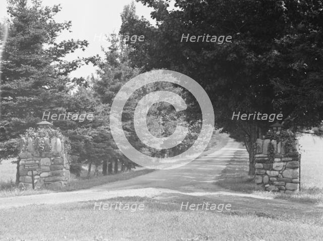Entrance to the driveway of the Baldrige estate, 1931 July 25. Creator: Arnold Genthe.