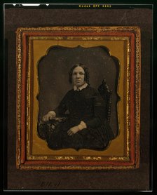 Unidentified woman, three-quarters length portrait, seated in chair with right arm..., ca. 1855. Creator: Francis Grice.