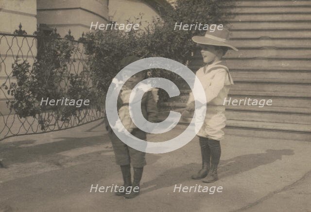 Quentin Roosevelt and Roswell Pinckney at play, c1902 June 17. Creator: Frances Benjamin Johnston.