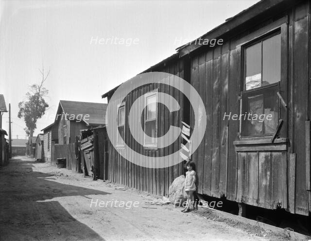 Mexican quarter of Los Angeles, one quarter mile from City Hall, 1936. Creator: Dorothea Lange.