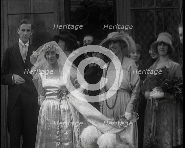Family Gathering for Photographs at the Wedding of Beatrice Lillie and Sir Robert Peel..., 1920. Creator: British Pathe Ltd.