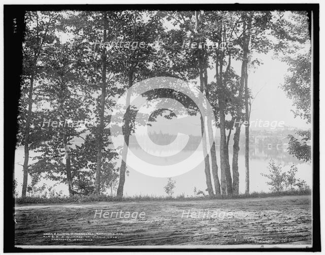 A glimpse of Mirror Lake, Adirondack Mountains, c1902. Creator: William H. Jackson.