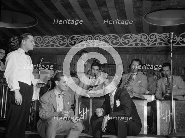 Portrait of Sam Donahue, Stan Kenton, Nick Callonus, and Hep, Aquarium, New York, N.Y., c.Dec. 1946. Creator: William Paul Gottlieb.