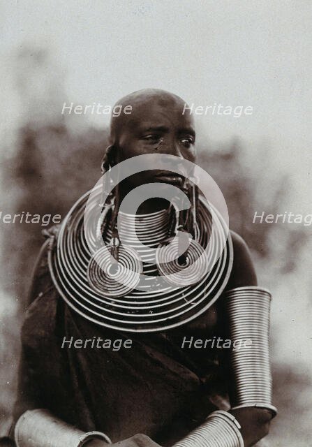 A young Masai woman, wearing much jewellery, approx 1900. Creator: Unknown.