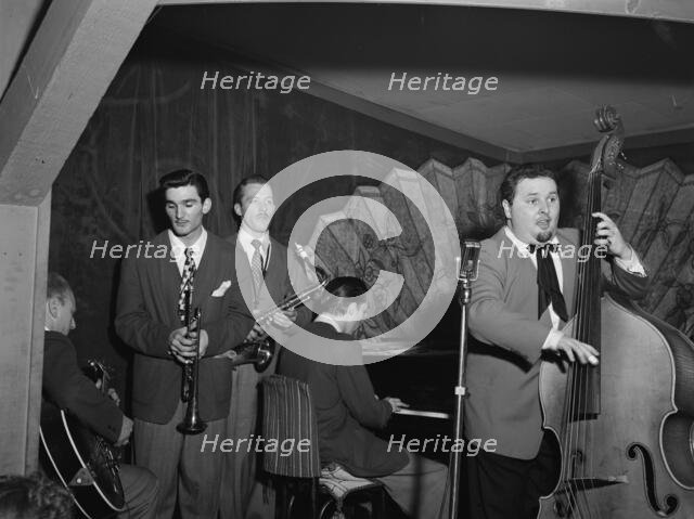 Portrait of Chubby Jackson, Conte Candoli, and Emmett Carls, Esquire Club...Long Island, N.Y., 1947. Creator: William Paul Gottlieb.