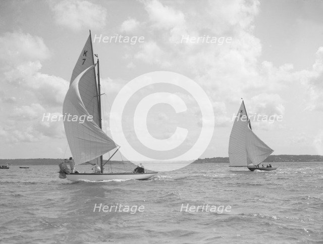 The 7 Metre class 'Anitra' (K4) and 'Ginevra' (K7) race downwind, 1912. Creator: Kirk & Sons of Cowes.