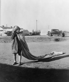 Young cotton picker, Kern County migrant camp, California, 1936. Creator: Dorothea Lange.
