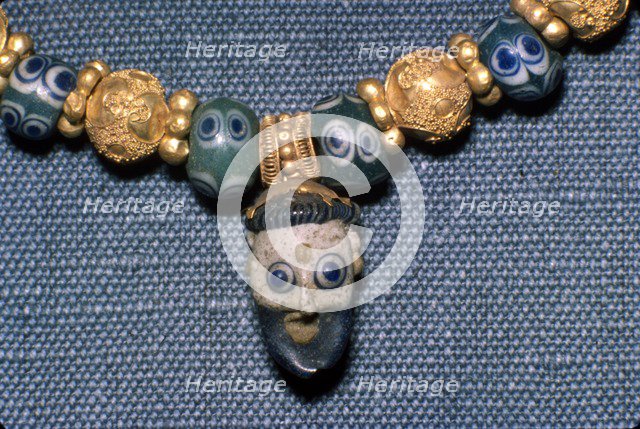 Phoenician glass head on Etruscan Necklace, c7th century BC. Artist: Unknown.