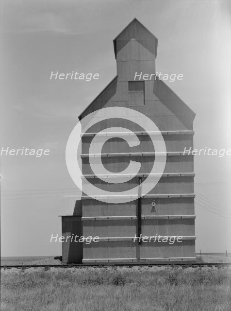 Grain elevator on the Texas Panhandle plains, Everett, Texas, 1938. Creator: Dorothea Lange.