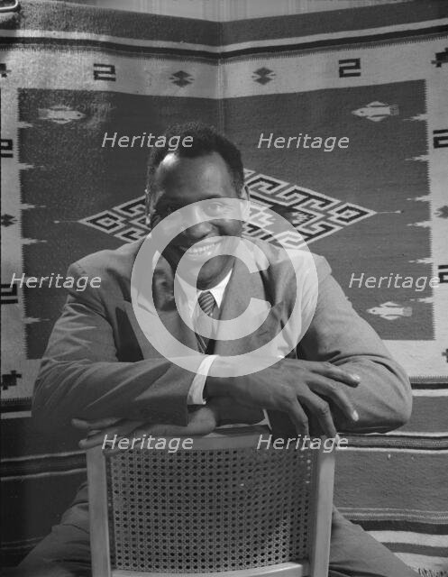 Paul Robeson, baritone, Washington, D.C, 1942. Creator: Gordon Parks.