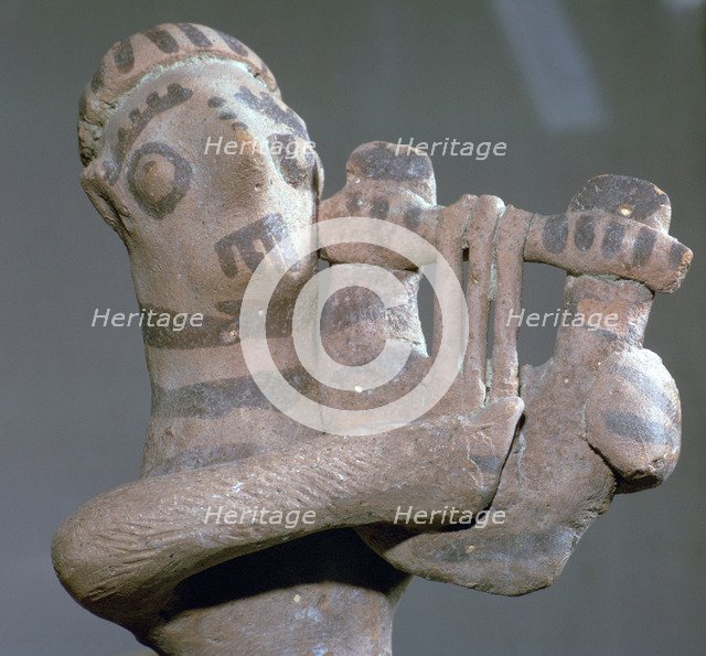 Minoan terracotta figure of a lyre-player, 8th century BC. Artist: Unknown