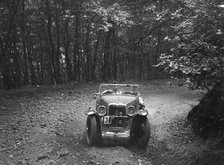 MG J2 competing in the B&HMC Brighton-Beer Trial, Fingle Bridge Hill, Devon, 1934. Artist: Bill Brunell.