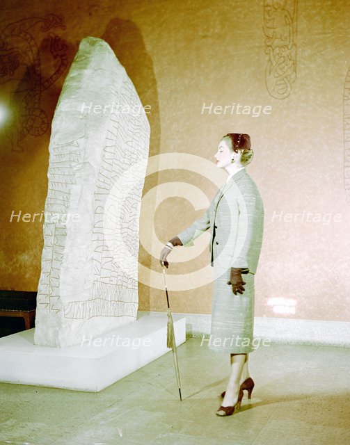 Female model shows a suit, the Historical Museum, Stockholm, 1950s. Artist: Göran Algård