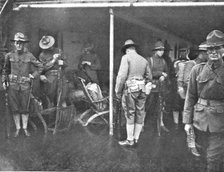 'Les Premiers Contingents Americains en France; A bord d'un transport: soldats se preparent..., 1917 Creator: Unknown.