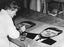 Pictures of President Kennedy being prepared to decorate the streets of Vienna, Austria, 1961. Artist: Unknown
