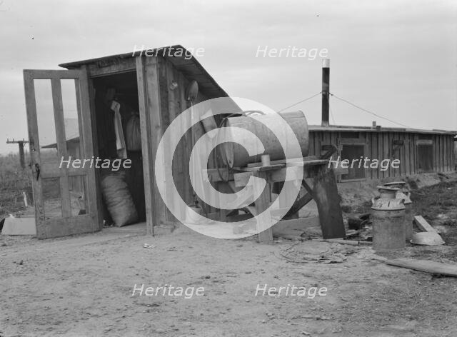 Entrance to Mr. and Mrs. Wardlow's dugout basement home, Dead Ox Flat, Oregon, 1939 Creator: Dorothea Lange.
