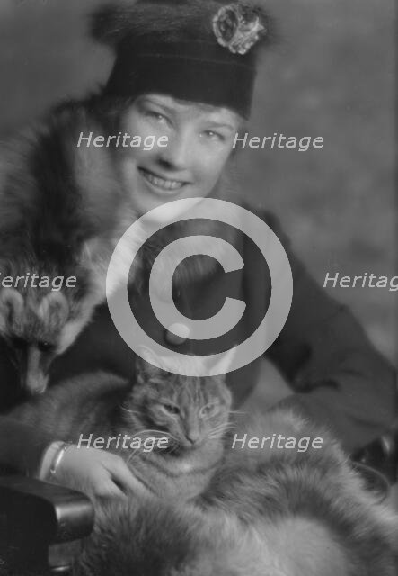 Campbell, Natalie, Miss, with Buzzer the cat, portrait photograph, 1914 Dec. 24. Creator: Arnold Genthe.